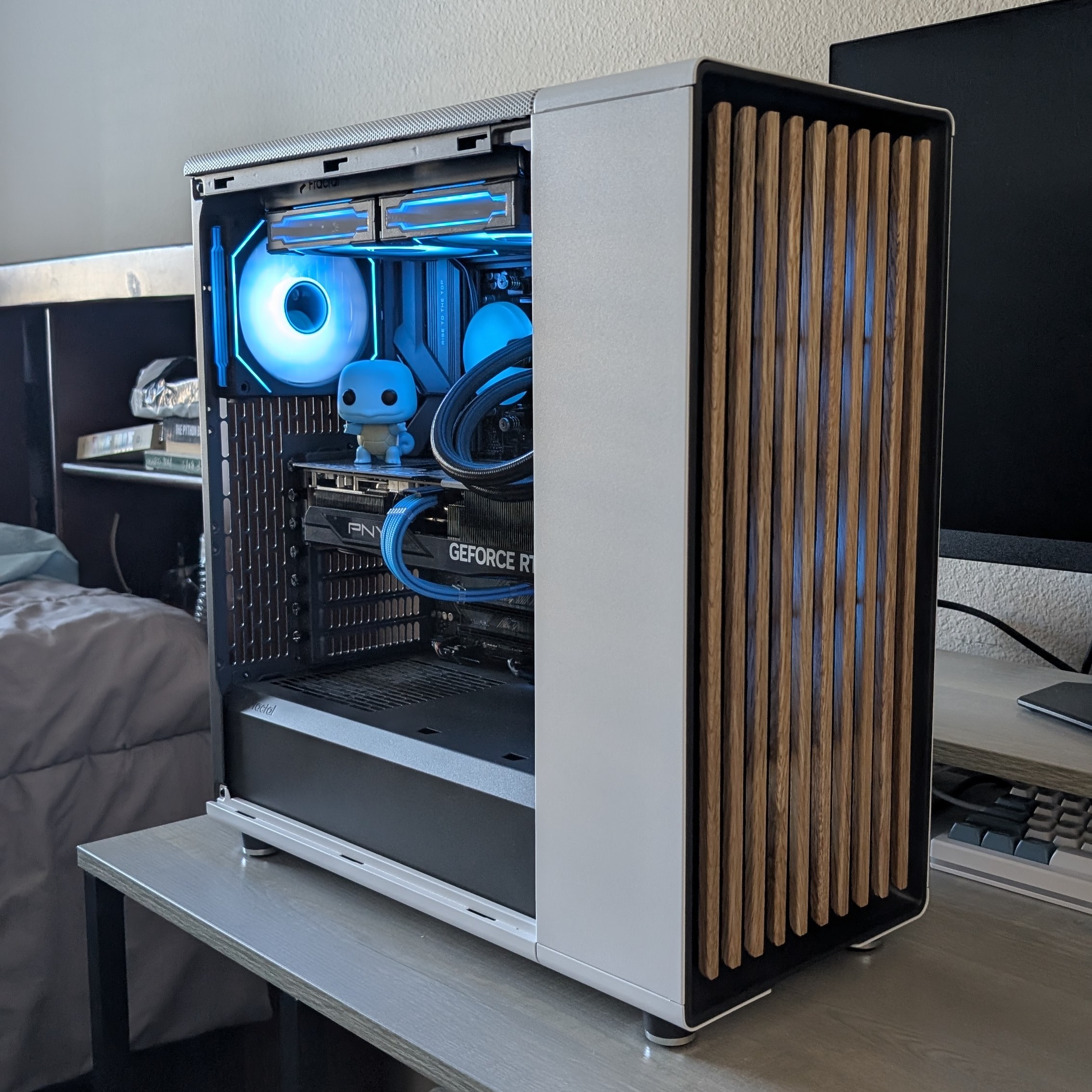 The picture shows the final computer build turned on, taken at an angle.